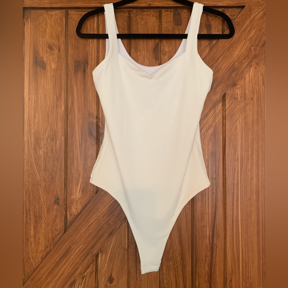 Klassy Network ivory bodysuit